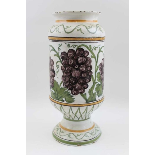 59 - A majolica drug jar, painted with fruiting vine in the round, inscribed Bvglossi, 29.5cm high