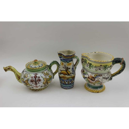 66 - A cantagalli majolica teapot, with serpent handle, stamped Firenze Italy, together with two other te... 