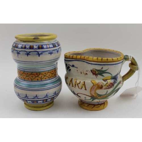 67 - A Deruta majolica small drug jar, together with a majolica jug, painted and inscribed Bevicara