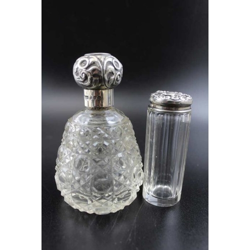 7 - A late Victorian silver mounted cut glass scent bottle, Birmingham 1894, 11cm high, together with a ... 