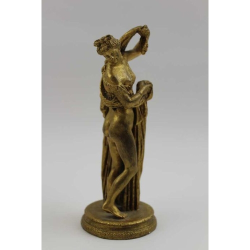 72 - A gilt metal cast Classical figure, draped semi-nude, on base 14cm high, together with a gilt metal ... 