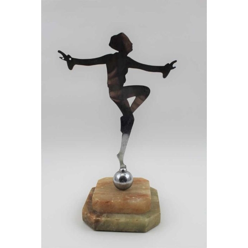 73 - An Art Deco figure, profile cut chrome dancer, balanced upon a ball, raised on a stepped Alabaster b... 