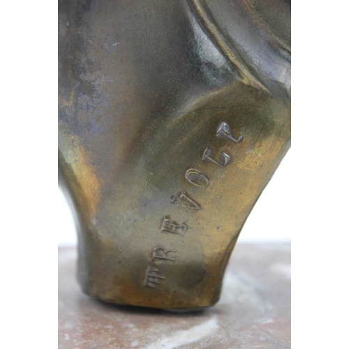 74 - An Art Deco ornament, formed as a cast metal profile of a young woman, inscribed 