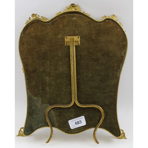 83 - A gilt brass decorative easel frame for displaying miniature paintings, hinged, glazed front panel. ... 