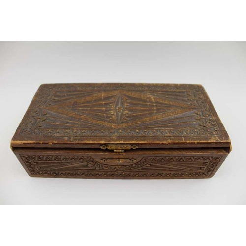 85 - A collection of decorative powder compacts, and a quizzing glass, in a carved wood box, 21.5cm wide
... 