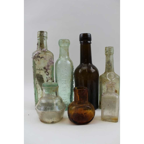 319 - A box containing a large selection of vintage bottles