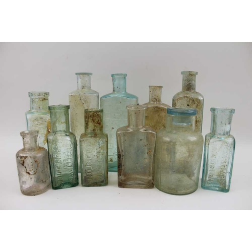 319 - A box containing a large selection of vintage bottles