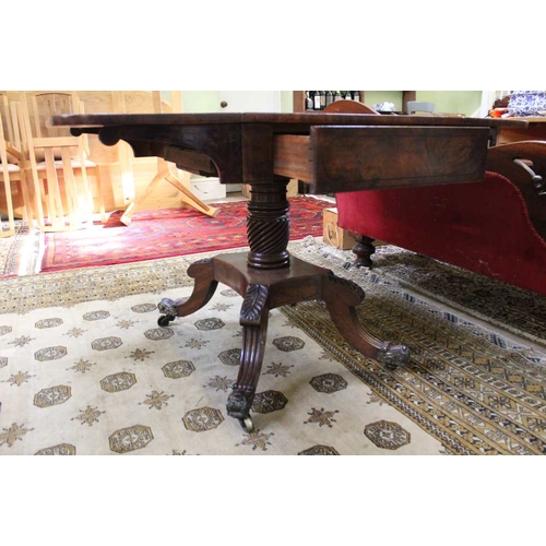 234 - A Regency period mahogany twin flapped table, crossbanded in Rosewood having a single drawer, on a s... 