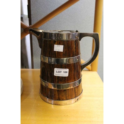 108 - A wooden jug, silver plated hoops of barrel form, with hinged cover