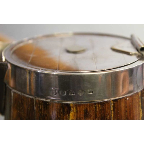 108 - A wooden jug, silver plated hoops of barrel form, with hinged cover