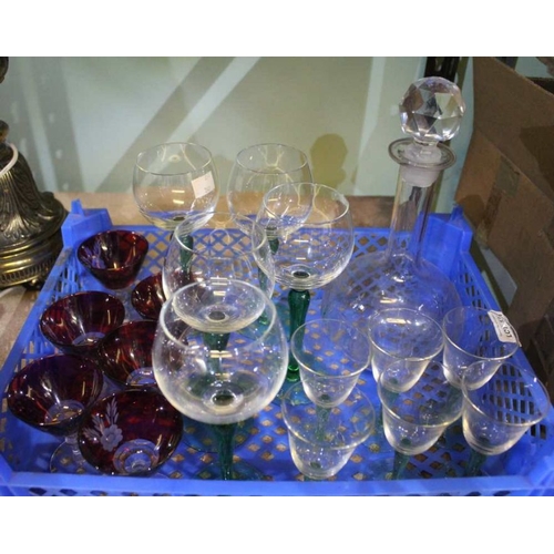 131 - Three sets of six small bowl stemmed glasses with a thumb cut decanter and stopper.