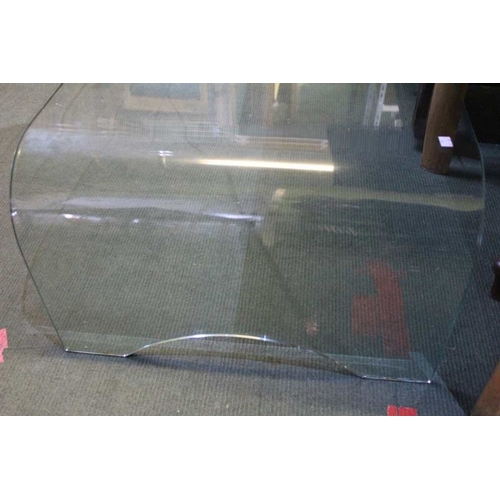 142 - A large glass coffee table, 110cm x 40cm