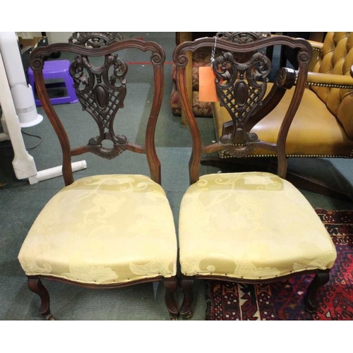 182 - A pair of first quarter 20th century fancy backed low seated chairs, probably from a salon suite