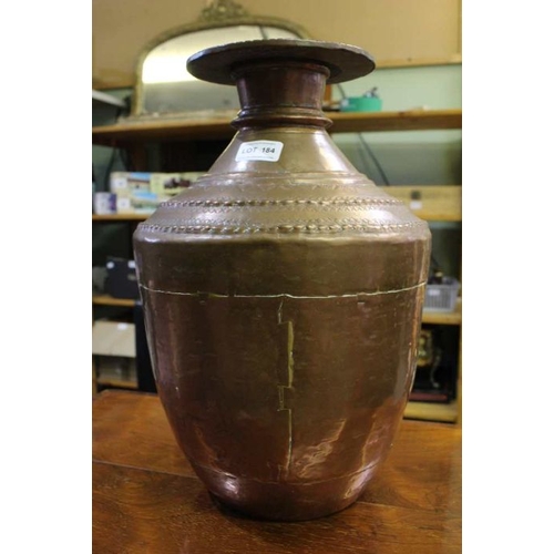 184 - A late 20th century hand made copper vessel purchased originally from a Ghurkha encampment. Standing... 