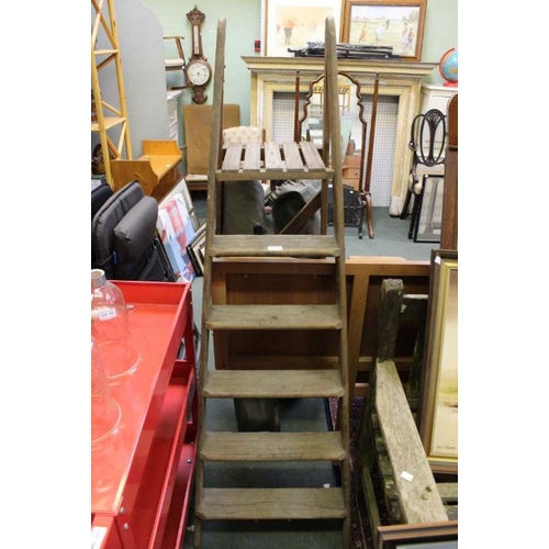 192 - A pair of wooden step ladders.