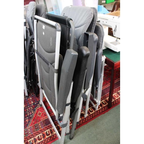 216 - Four folding camping/caravan chairs.