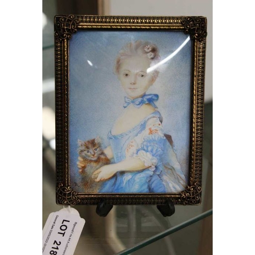 218 - Late 20th century portrait of a girl with her pet, initialled in filigree effect frame.