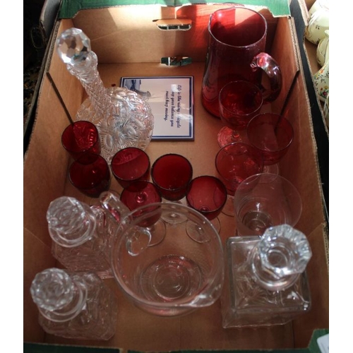 49 - A box of domestic glassware, to include decanters, cranberry glass drinking glasses, etc.