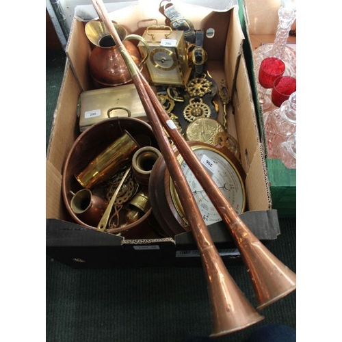 50 - A box containing a selection of brassware various, to include horse brasses