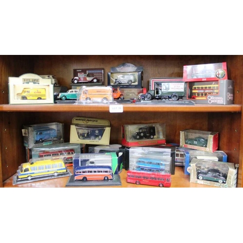 58 - Two shelves containing boxed model vehicles various.