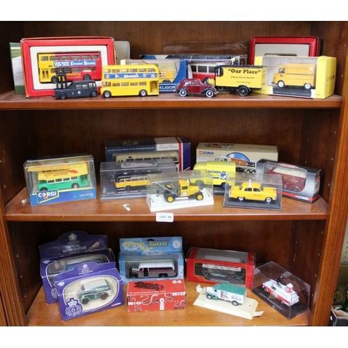 59 - Three shelves of various boxed model motor vehicles.