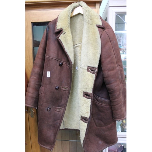 264 - Two gentleman's sheepskin jackets, both well used & one has tear to shoulder