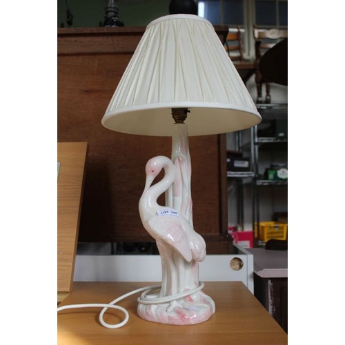 108 - Four table lamps, one modelled as a pottery heron.