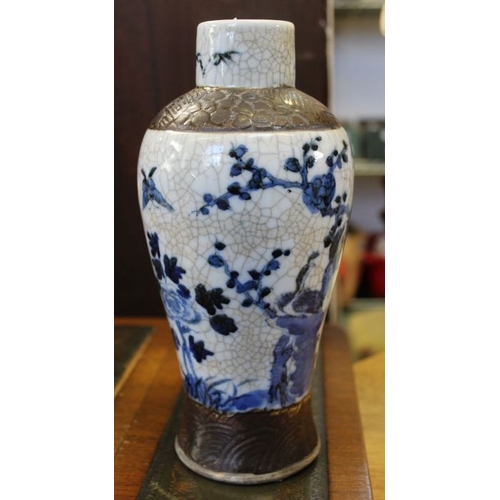 121 - Chinese blue and white crackle glazed jar together with a pair of silk pictures.