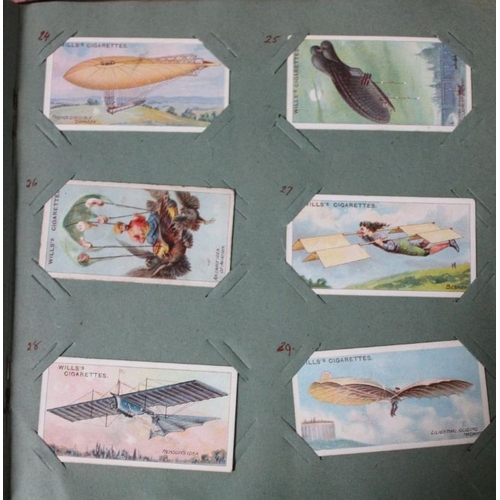 14 - A quantity of cigarette cards, mostly in albus, one dated 1907, includes Wills Aviation with airship... 