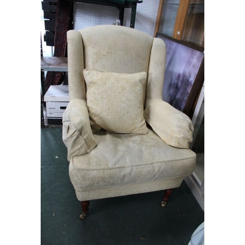 147 - A Wesley Barrell - Old gold chenille three person Knowle sofa with a matching armchair., together wi... 