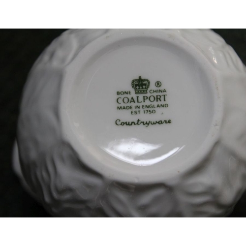 154 - A box containing predominantly Coalport white glazed leaf patterned table wares.