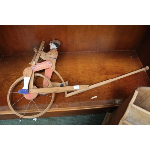 157 - Two wooden letter racks and a wooden child's toy.