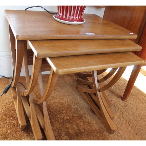 229 - A 1970's design teak nest of three tables by Nathan. Design name 'Citadel'