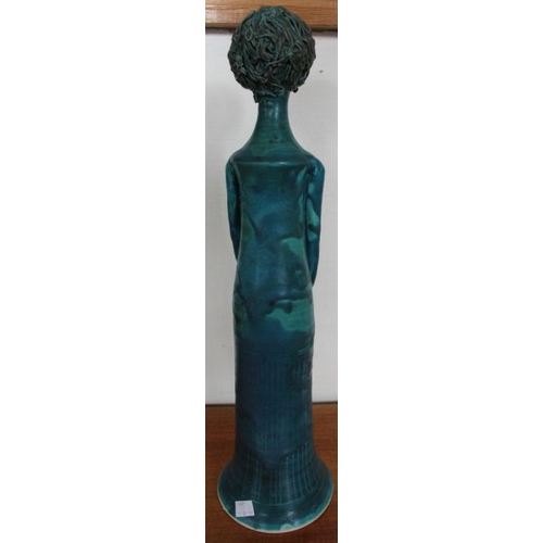 232 - A turquoise glazed New Zealand studio pottery female figurine, unmarked, 48cm high