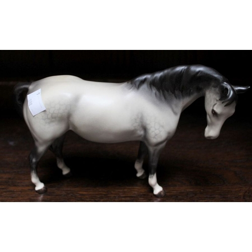 3 - A set of three dapple grey Beswick horses, A/F