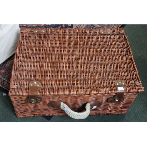 68 - A vintage wicker picnic set with complete contents.