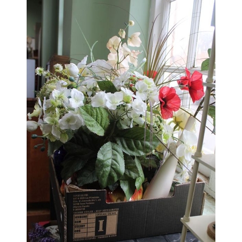 85 - A box of assorted vases with artificial flower arrangements.