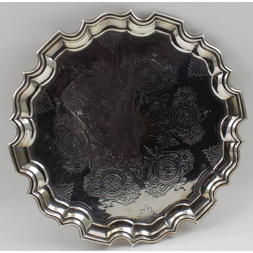 10 - William Aitkin, an Edwardian silver salver of Georgian pie-crust form, chased decoration, uninscribe... 