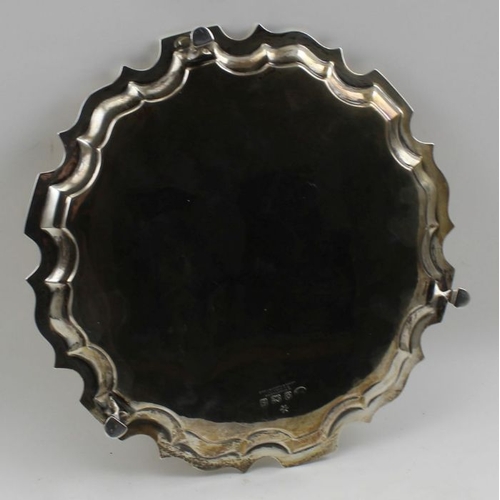 10 - William Aitkin, an Edwardian silver salver of Georgian pie-crust form, chased decoration, uninscribe... 