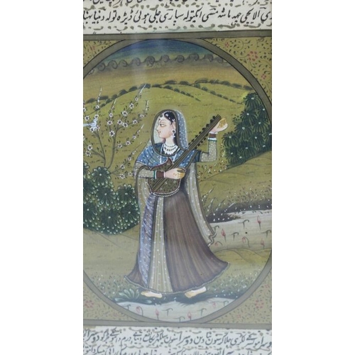 108 - An Indian painting in the Moghul manner, depicts a young lady musician in a garden, script text to t... 