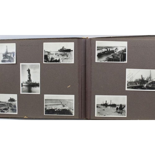 129 - A family photograph album recording a World Cruise 1927