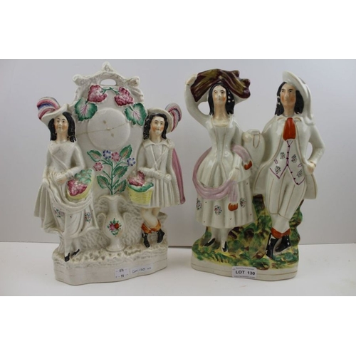 130 - Two large Staffordshire pottery figure groups, 32cm high