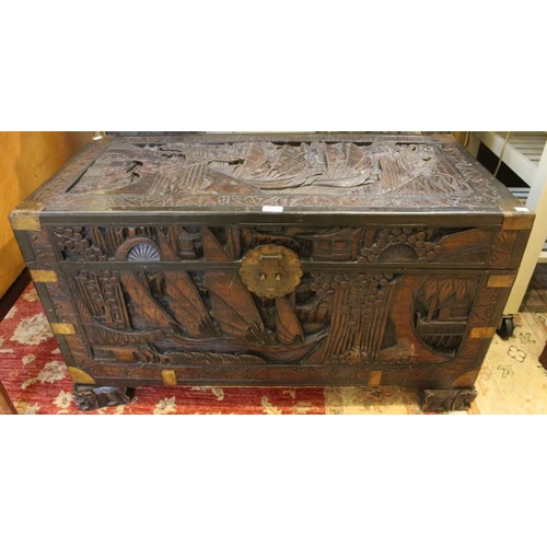 197 - An imported carved wooden chest