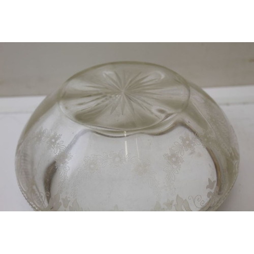 21 - A cut glass fruit bowl, with silver rim, 20cm in diameter, and a lemonade jug