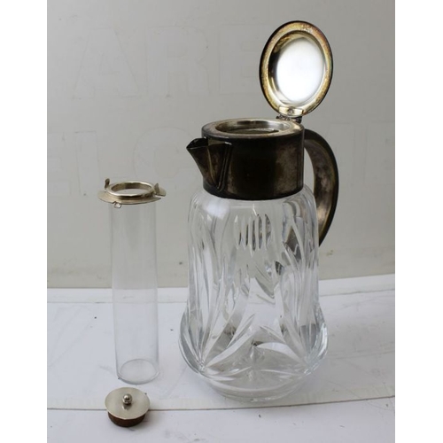 21 - A cut glass fruit bowl, with silver rim, 20cm in diameter, and a lemonade jug