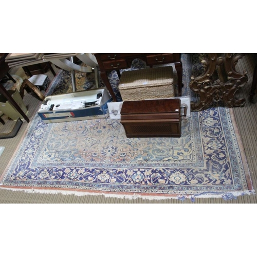 219 - A large Persian design carpet (sun damaged), 228cm x 302cm