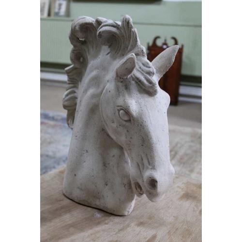 225 - A cast resin stone effect horses head, 46cm high