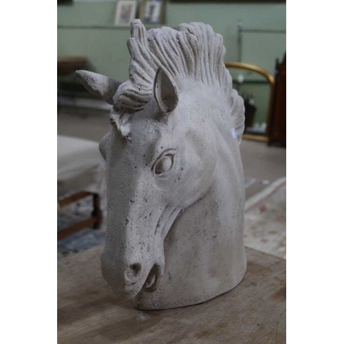 225 - A cast resin stone effect horses head, 46cm high