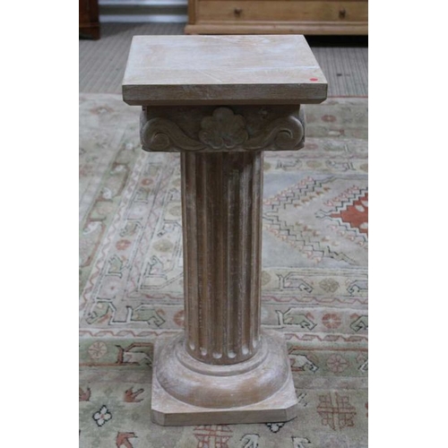 226 - A limed wood carved pillar jardiniere stand, 72cm high x 34cm square