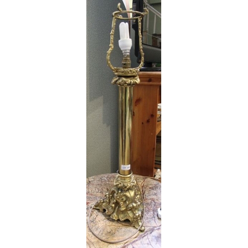 228 - A brass table lamp, with decorative base